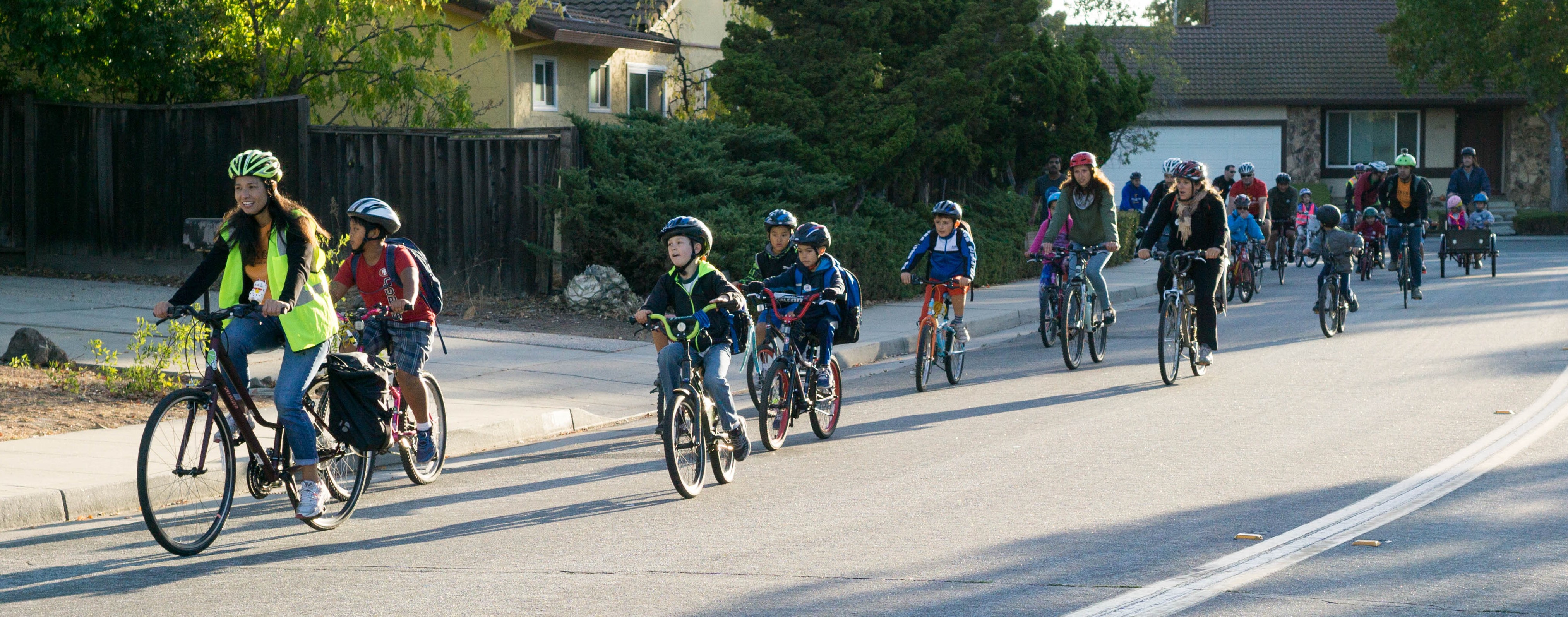 School-Age Children Riding Bikes to School