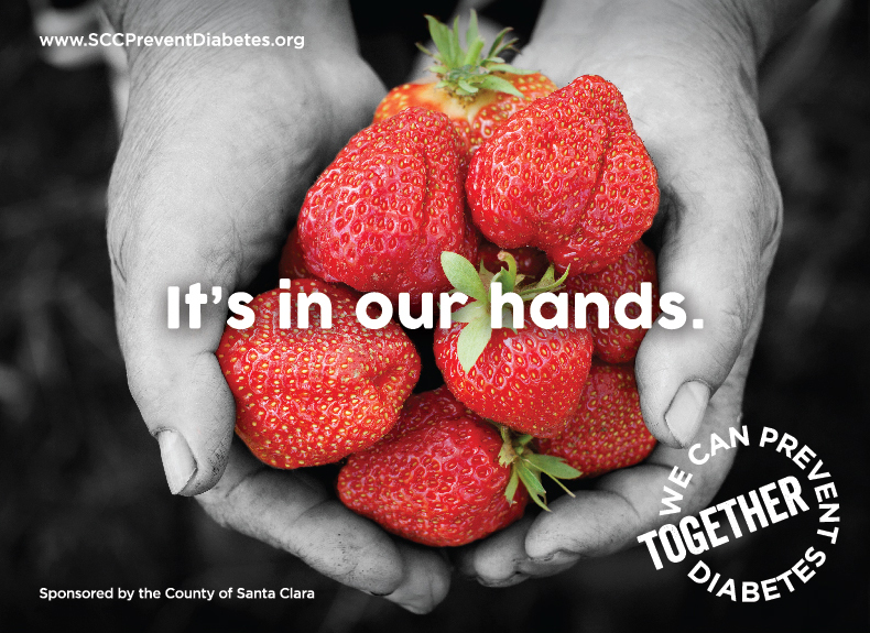 Hands holding strawberries