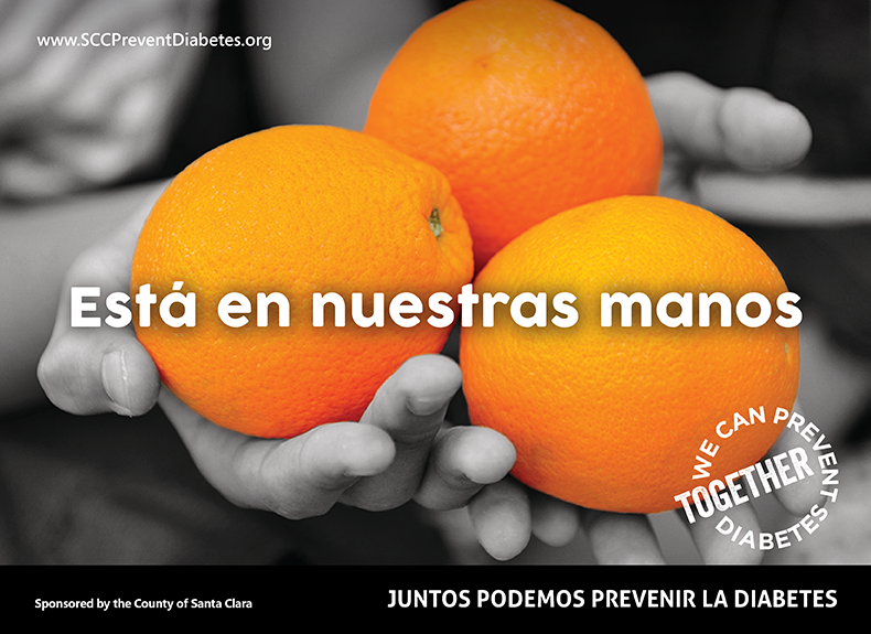 A person holds three oranges in their hands and the following text overlays the image: It's in our hands.
