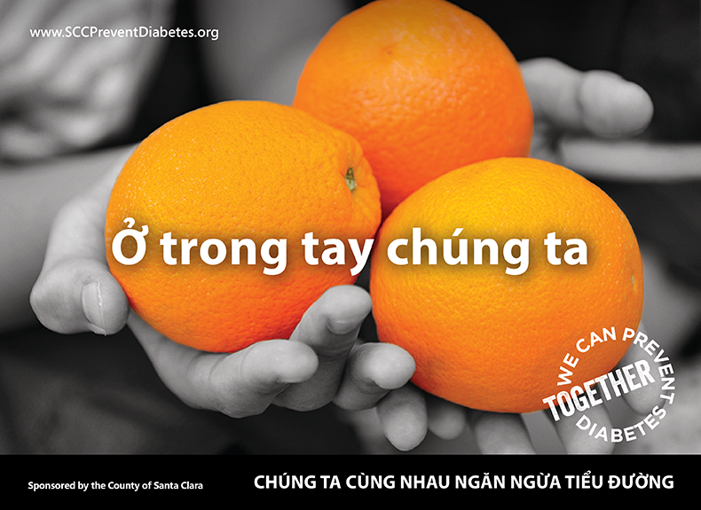 A person holds three oranges in their hands and the following text overlays the image: It's in our hands.