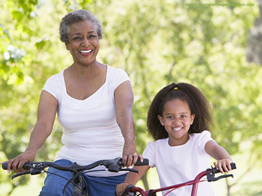 Grandma and granddaughter riding bikes